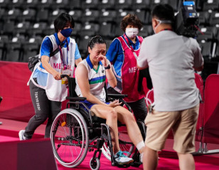 Beiwen Zhang Retires Hurt with Achilles Tendon Injury