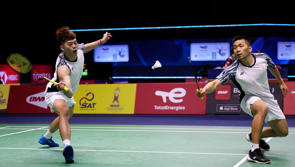 Yang and Lu show their delight at winning the tie for their country.